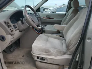 2004 Kia Sedona LX with VIN KNDUP131346575851, listed as a Copart auction lot 73614194 with 153,928 mi miles and Salvage Title. Bid and sale history available at carsss.com. Image 7.