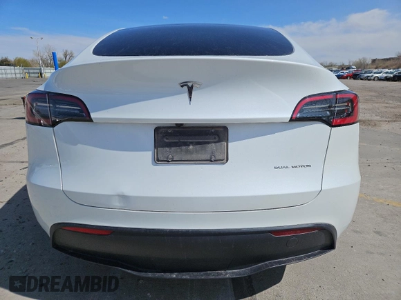 2024 Tesla Model Y Long Range with VIN 7SAYGAEE7RF205700, listed as a Copart auction lot 53814155 with 8,986 mi miles and Salvage Title. Bid and sale history available at DreamBid. Image 6.