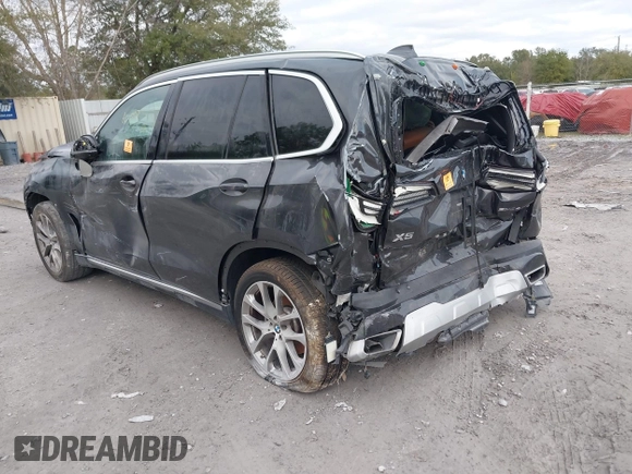 2021 BMW X5 sDrive40i with VIN 5UXCR4C07M9G60674, listed as a IAAI auction lot 38203174 with 1 mi miles. Bid and sale history available at carsss.com. Image 3.