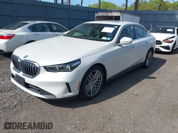 2024 BMW 5 Series 530i xDrive with VIN WBA53FJ06RCR29262, listed as a IAAI auction lot 42157428 with 27,918 mi miles and . Bid and sale history available at DreamBid. Image 2.