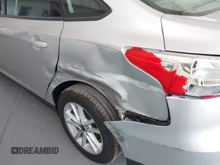 2016 Ford Focus SE with VIN 1FADP3F25GL317830, listed as a IAAI auction lot 42348499 with 8,679 mi miles and . Bid and sale history available at DreamBid. Image 6.