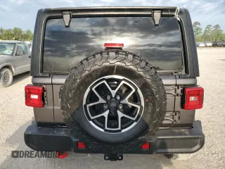 2024 Jeep Wrangler Rubicon z VIN 1C4PJXFG6RW261748, wystawiony jako Copart lot #51479585 z przebiegiem 7 911 mil mil oraz Szkoda całkowita • Salvage title. Historia ofert i sprzedaży dostępna na DreamBid. Obrazek 6.