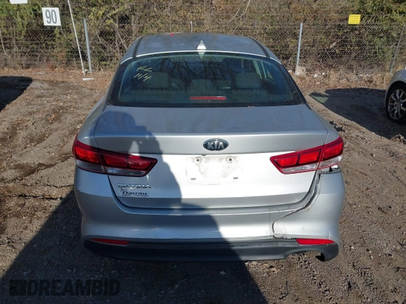 2016 Kia Optima LX with VIN 5XXGT4L35GG059931, listed as a IAAI auction lot 40995180 with 130,596 mi miles. Bid and sale history available at carsss.com. Image 15.