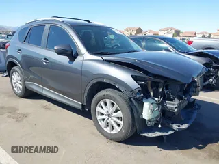 2016 Mazda CX-5 Touring with VIN JM3KE2CY4G0695947, listed as a IAAI auction lot 41824490 with 162,191 mi miles and . Bid and sale history available at carsss.com. Image 1.