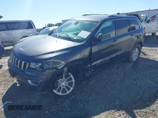 2018 Jeep Grand Cherokee Laredo E with VIN 1C4RJFAG8JC335459, listed as a IAAI auction lot 41850163 with 93,289 mi miles. Bid and sale history available at carsss.com. Image 17.
