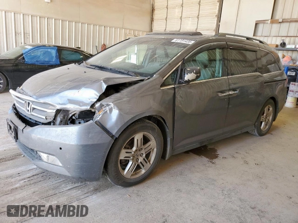 2012 Honda Odyssey Touring с VIN 5FNRL5H94CB049626, выставлен на аукционе Copart как лот 61191435 с пробегом 199 728 миль миль и Списание • Salvage title. История ставок и продаж доступна на DreamBid. Изображение 1.