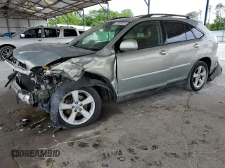 2006 Lexus RX 330 with VIN 2T2GA31U96C049125, listed as a Copart auction lot 57336075 with 165,108 mi miles and Salvage title. Bid and sale history available at DreamBid. Image 1.