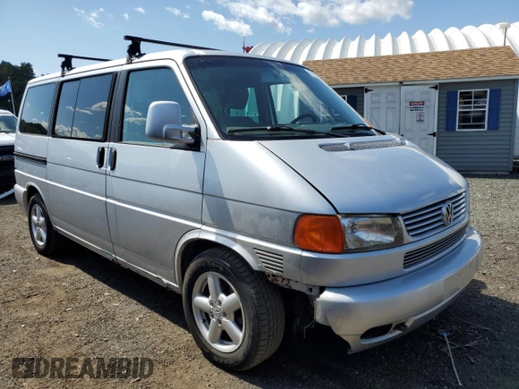 2003 Volkswagen EuroVan MV с VIN WV2MB47023H044047, выставлен на аукционе Copart как лот 71014624 с пробегом 189 485 миль миль и Чистый • Clean title. История ставок и продаж доступна на DreamBid. Изображение 4.