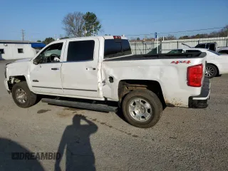 2016 Chevrolet Silverado 1500 High Country with VIN 3GCUKTEC0GG227100, listed as a Copart auction lot 48562765 with 146,466 mi miles and Salvage Title. Bid and sale history available at DreamBid. Image 2.