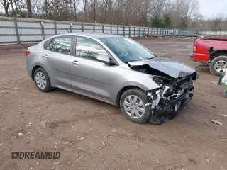 2023 Kia Rio LX with VIN 3KPA24AD7PE520723, listed as a IAAI auction lot 41184281 with 11,971 mi miles. Bid and sale history available at carsss.com. Image 1.