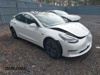 2020 Tesla Model 3 Long Range with VIN 5YJ3E1EB6LF618931, listed as a IAAI auction lot 41867451 with 47,502 mi miles. Bid and sale history available at carsss.com. Image 1.