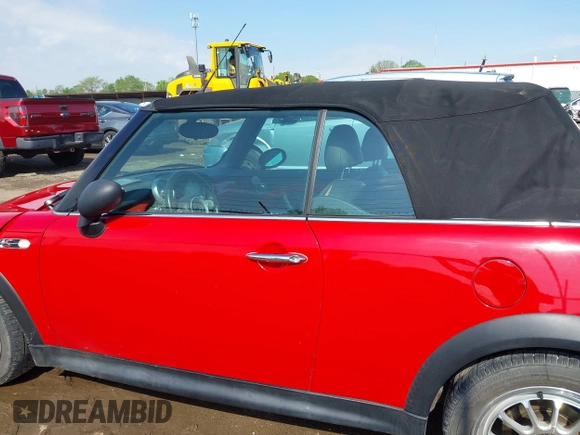 2006 MINI Convertible S with VIN WMWRH33596TK58563, listed as a IAAI auction lot 42210790 with 102,476 mi miles and . Bid and sale history available at DreamBid. Image 14.