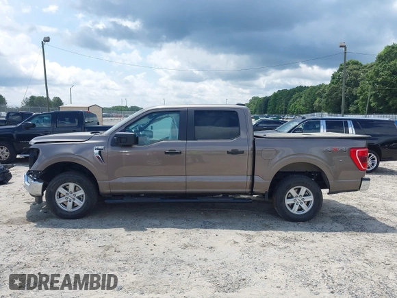 2022 Ford F-150 XL z VIN 1FTEW1EB9NFB50424, wystawiony jako IAAI lot #42553241 z przebiegiem 32 982 mil mil oraz . Historia ofert i sprzedaży dostępna na DreamBid. Obrazek 14.