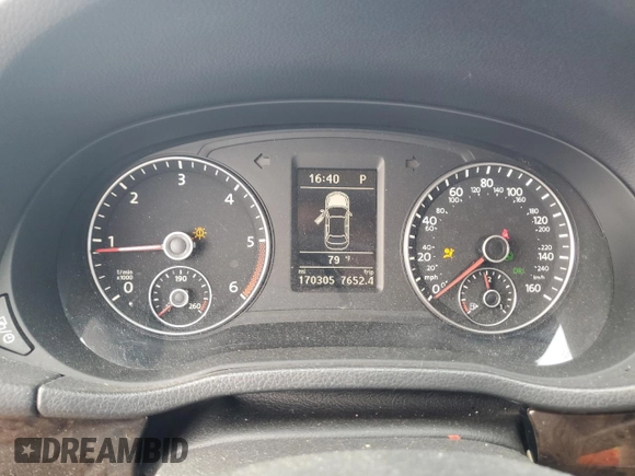 2014 Volkswagen Passat SEL Premium z VIN 1VWCN7A34EC066375, wystawiony jako Copart lot #54016005 z przebiegiem 170 305 mil mil oraz Szkoda całkowita • Salvage title. Historia ofert i sprzedaży dostępna na DreamBid. Obrazek 9.