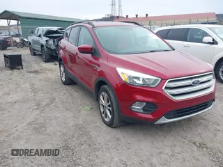 2018 Ford Escape SE z VIN 1FMCU9GD6JUA18684, wystawiony jako IAAI lot #41499540 z przebiegiem 105 127 mil mil oraz . Historia ofert i sprzedaży dostępna na DreamBid. Obrazek 1.