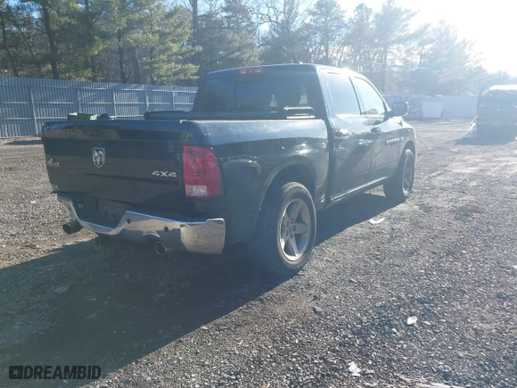 2012 Ram 1500 Outdoorsman with VIN 1C6RD7LT2CS258420, listed as a IAAI auction lot 41590920 with 124,143 mi miles. Bid and sale history available at carsss.com. Image 4.