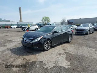 2014 Hyundai Sonata SE with VIN 5NPEC4AC7EH816873, listed as a IAAI auction lot 42026926 with 155,794 mi miles and . Bid and sale history available at DreamBid. Image 2.