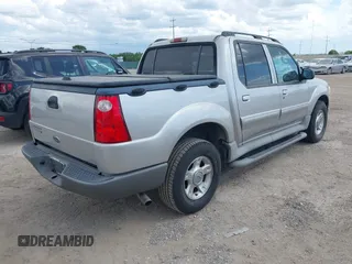 2003 Ford Explorer Sport Trac XLS z VIN 1FMZU67E43UA72537, wystawiony jako IAAI lot #42575959 z przebiegiem 142 692 mil mil oraz . Historia ofert i sprzedaży dostępna na DreamBid. Obrazek 4.