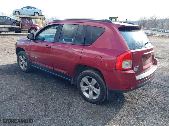 2012 Jeep Compass Latitude with VIN 1C4NJDEBXCD697985, listed as a IAAI auction lot 41653985 with 151,492 mi miles. Bid and sale history available at carsss.com. Image 3.