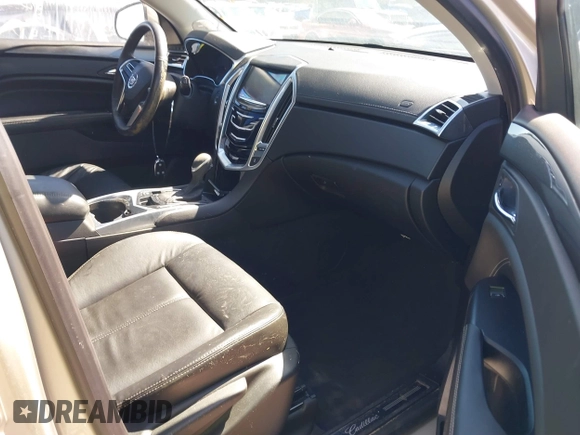 2015 Cadillac SRX with VIN 3GYFNAE37FS536363, listed as a IAAI auction lot 41551790 with 48,422 mi miles and . Bid and sale history available at DreamBid. Image 5.