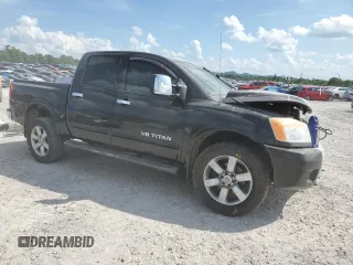 2011 Nissan Titan SL z VIN 1N6AA0EC8BN312137, wystawiony jako Copart lot #60227105 z przebiegiem 194 973 mil mil oraz Szkoda całkowita • Salvage title. Historia ofert i sprzedaży dostępna na DreamBid. Obrazek 4.