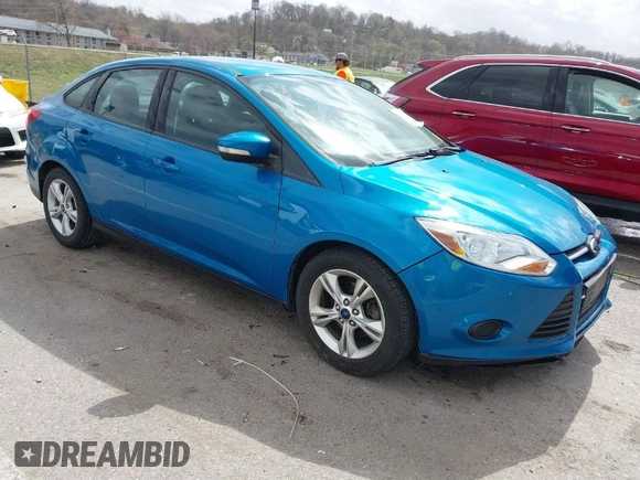 2014 Ford Focus SE with VIN 1FADP3F23EL310193, listed as a IAAI auction lot 41808058 with 53,658 mi miles. Bid and sale history available at carsss.com. Image 1.