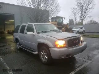 2000 GMC Denali with VIN 1GKEK13R9YR104210, listed as a Copart auction lot 85599964 with 1,548,394 mi miles and Salvage Title. Bid and sale history available at carsss.com. Image 12.