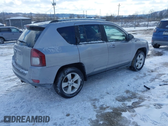 2015 Jeep Compass Sport with VIN 1C4NJDBB1FD206616, listed as a IAAI auction lot 41595052 with 112,836 mi miles. Bid and sale history available at carsss.com. Image 4.