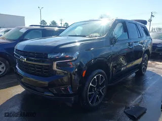 2023 Chevrolet Tahoe RST with VIN 1GNSKRKL2PR244986, listed as a IAAI auction lot 41571368 with 47,646 mi miles. Bid and sale history available at carsss.com. Image 2.