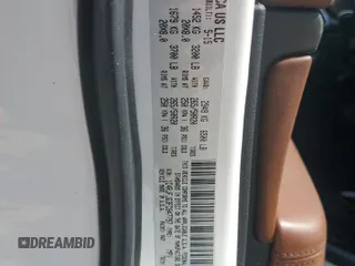 2015 Jeep Grand Cherokee Summit with VIN 1C4RJFJG3FC847797, listed as a Copart auction lot 54848085 with 53,506 mi miles and Salvage Title. Bid and sale history available at DreamBid. Image 13.