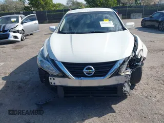 2016 Nissan Altima SV with VIN 1N4AL3AP4GC218983, listed as a IAAI auction lot 41346784 with 167,246 mi miles and . Bid and sale history available at DreamBid. Image 6.