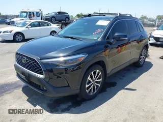 2023 Toyota Corolla Cross XLE z VIN 7MUDAAAG3PV069634, wystawiony jako IAAI lot #42489692 z przebiegiem 18 923 mil mil oraz . Historia ofert i sprzedaży dostępna na DreamBid. Obrazek 18.