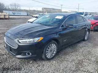 2014 Ford Fusion Energi Titanium with VIN 3FA6P0SU5ER269923, listed as a IAAI auction lot 41086950 with 135,351 mi miles. Bid and sale history available at carsss.com. Image 2.