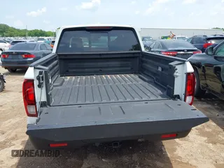 2020 Honda Ridgeline RTL with VIN 5FPYK3F51LB029859, listed as a IAAI auction lot 42462285 with 57,399 mi miles and . Bid and sale history available at DreamBid. Image 17.