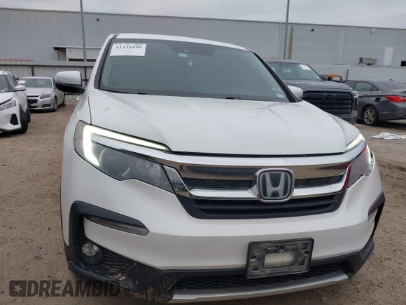 2020 Honda Pilot EX-L with VIN 5FNYF5H55LB029238, listed as a IAAI auction lot 41330490 with 116,787 mi miles. Bid and sale history available at carsss.com. Image 12.