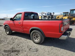 1998 Nissan Frontier XE with VIN 1N6DD21S2WC364538, listed as a Copart auction lot 62867545 with 261,987 mi miles and Salvage title. Bid and sale history available at DreamBid. Image 2.