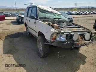 1994 Land Rover Discovery with VIN SALJY1283RA087219, listed as a Copart auction lot 52432815 with Not Provided miles and Salvage Title. Bid and sale history available at DreamBid. Image 11.