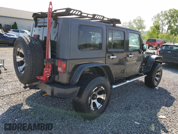 2008 Jeep Wrangler Unlimited X z VIN 1J4GA39128L518897, wystawiony jako Copart lot #52297525 z przebiegiem 163 676 mil mil oraz Nie do naprawy • Non repairable. Historia ofert i sprzedaży dostępna na DreamBid. Obrazek 3.