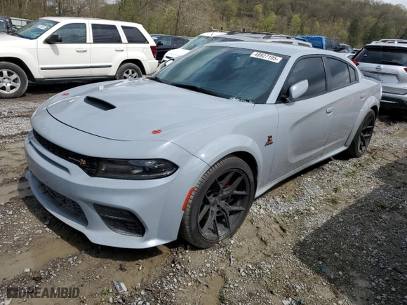 2020 Dodge Charger Scat Pack with VIN 2C3CDXGJ2LH232208, listed as a Copart auction lot 48927195 with 52,759 mi miles and Salvage Title. Bid and sale history available at carsss.com. Image 1.