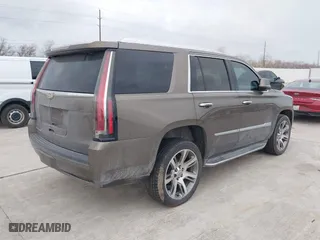 2015 Cadillac Escalade Luxury with VIN 1GYS3MKJ9FR725818, listed as a IAAI auction lot 41596731 with 224,246 mi miles. Bid and sale history available at carsss.com. Image 4.
