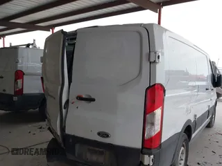 2019 Ford Transit with VIN 1FTYE1ZM2KKB46391, listed as a IAAI auction lot 41362328 with 128,327 mi miles and . Bid and sale history available at carsss.com. Image 4.