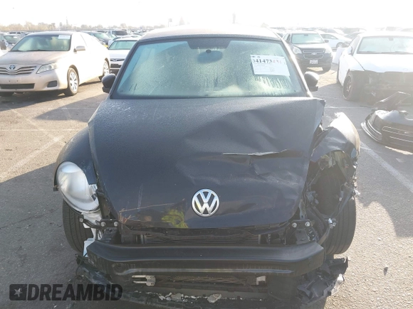 2019 Volkswagen Beetle S with VIN 3VW5DAAT3KM511269, listed as a IAAI auction lot 41473431 with 34,757 mi miles and . Bid and sale history available at DreamBid. Image 13.