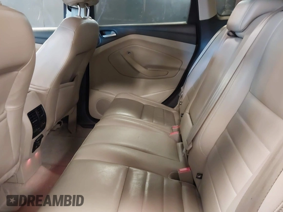 2014 Ford Escape Titanium with VIN 1FMCU9JX0EUE45254, listed as a IAAI auction lot 42038700 with 60,103 mi miles. Bid and sale history available at carsss.com. Image 8.