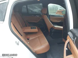 2018 BMW X4 xDrive28i with VIN 5UXXW3C57J0T82081, listed as a IAAI auction lot 41991254 with 100,654 mi miles. Bid and sale history available at carsss.com. Image 8.