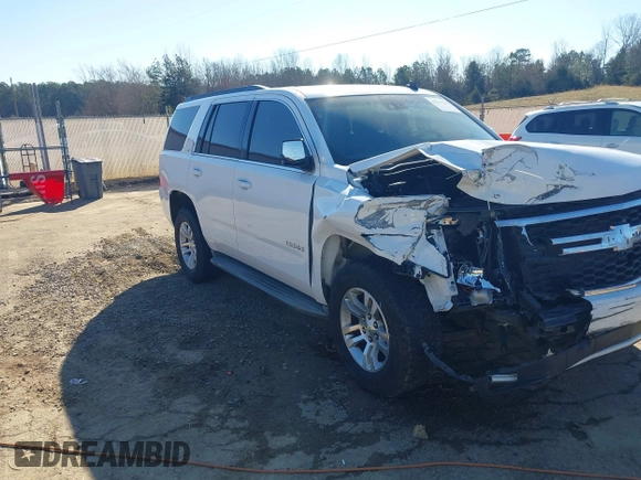 2015 Chevrolet Tahoe LT with VIN 1GNSCBKC0FR104096, listed as a IAAI auction lot 41679298 with 231,005 mi miles and . Bid and sale history available at DreamBid. Image 17.