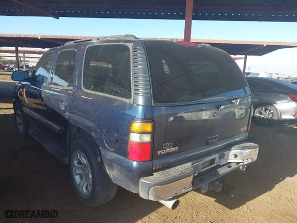 2005 GMC Yukon SLT with VIN 1GKEC13T35J185918, listed as a IAAI auction lot 41025720 with 162,613 mi miles. Bid and sale history available at carsss.com. Image 3.