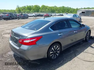 2017 Nissan Altima SV z VIN 1N4AL3AP6HC498990, wystawiony jako IAAI lot #42095268 z przebiegiem 105 253 mil mil oraz . Historia ofert i sprzedaży dostępna na DreamBid. Obrazek 4.