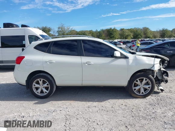 2009 Nissan Rogue SL with VIN JN8AS58T39W058077, listed as a IAAI auction lot 41311692 with 131,765 mi miles and . Bid and sale history available at DreamBid. Image 13.