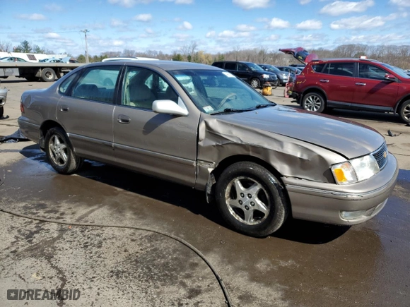 1999 Toyota Avalon XL with VIN 4T1BF18B6XU297311, listed as a Copart auction lot 49961605 with NaN miles and Salvage Title. Bid and sale history available at carsss.com. Image 4.
