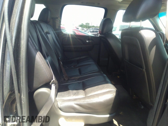 2013 Chevrolet Suburban LT with VIN 1GNSCJE05DR142688, listed as a IAAI auction lot 42214548 with 236,464 mi miles and . Bid and sale history available at DreamBid. Image 8.
